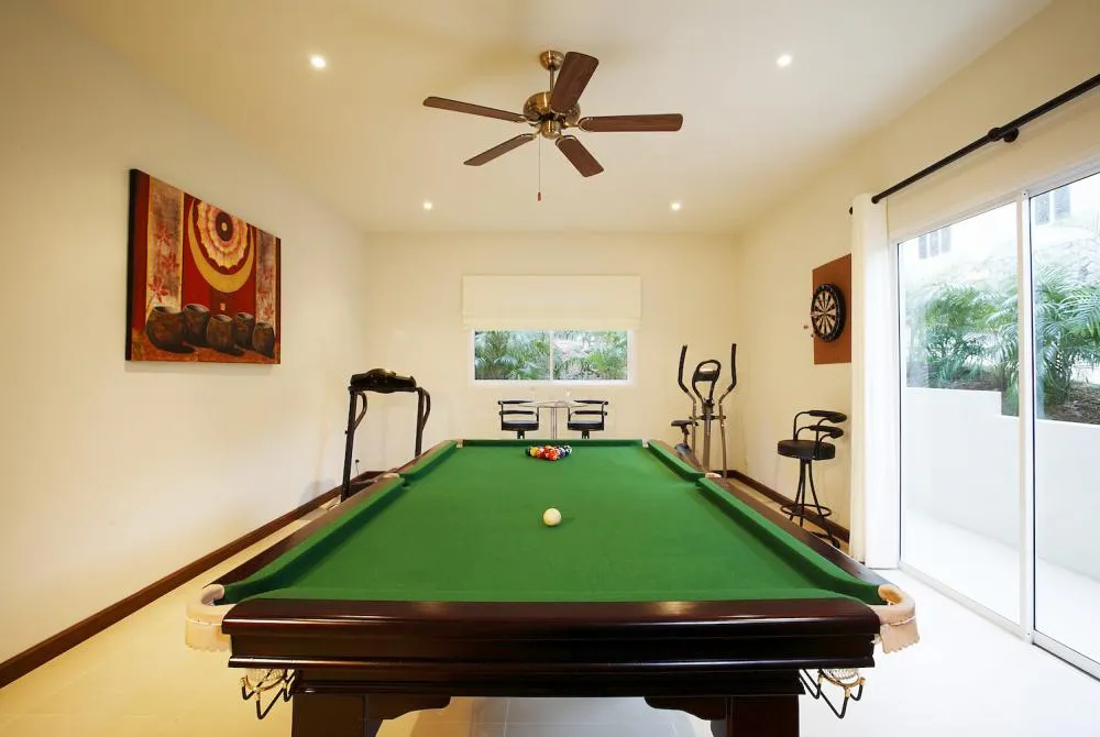 Games room with direct access to the outside sun deck and swimming pool