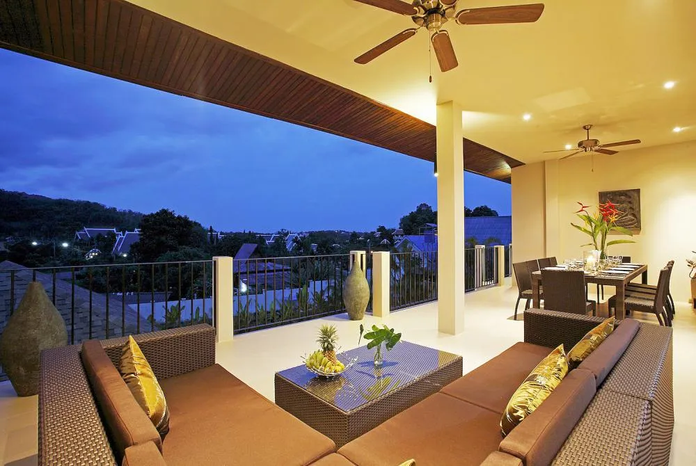 Soft seating on balcony to relax and enjoy evening sundowners while overlooking the views of the valley