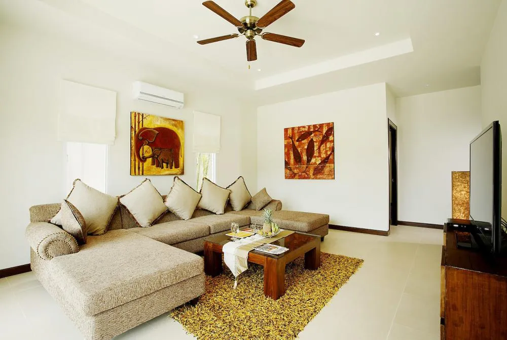 Second Living Room with flat screen TV and access to swimming pool and sundeck